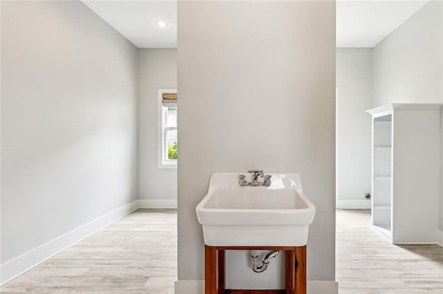 640 Bocage Ct N, Covington, LA 70433 - bathroom featuring wood finished floors, baseboards, and recessed lighting