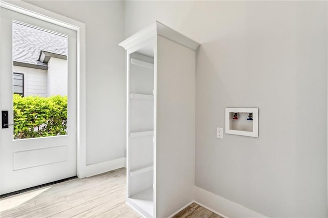 640 Bocage Ct N, Covington, LA 70433 - laundry area with hookup for a washing machine, wood finished floors, and baseboards