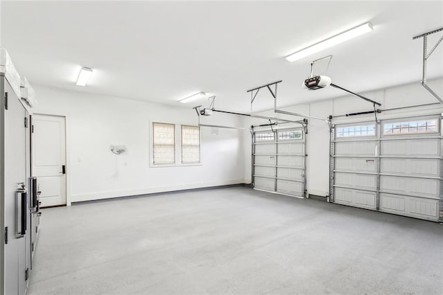 640 Bocage Ct N, Covington, LA 70433 - garage with a garage door opener and baseboards