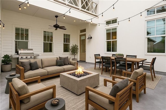 640 Bocage Ct N, Covington, LA 70433 - view of patio featuring an outdoor living space with a fire pit, outdoor dining space, and ceiling fan