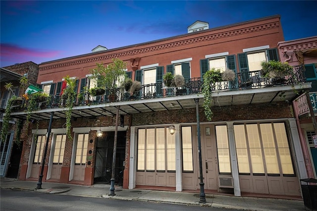 931 Chartres Street 13&14, New Orleans, LA 70116 - view of property at dusk