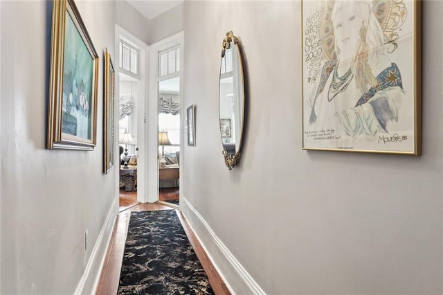 931 Chartres Street 13&14, New Orleans, LA 70116 - corridor featuring wood finished floors and baseboards