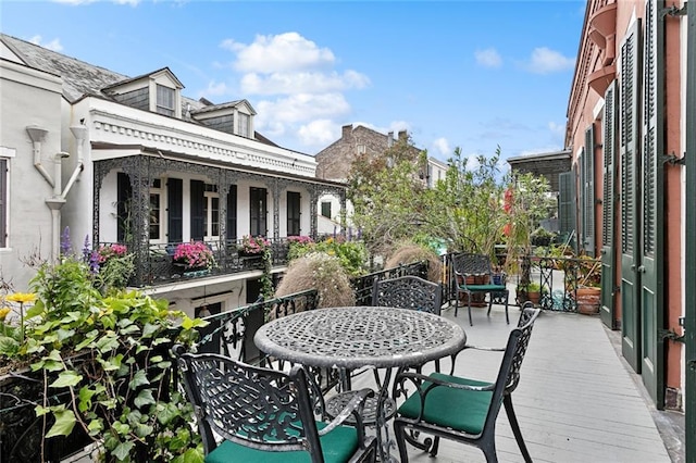 931 Chartres Street 13&14, New Orleans, LA 70116 - balcony with outdoor dining area