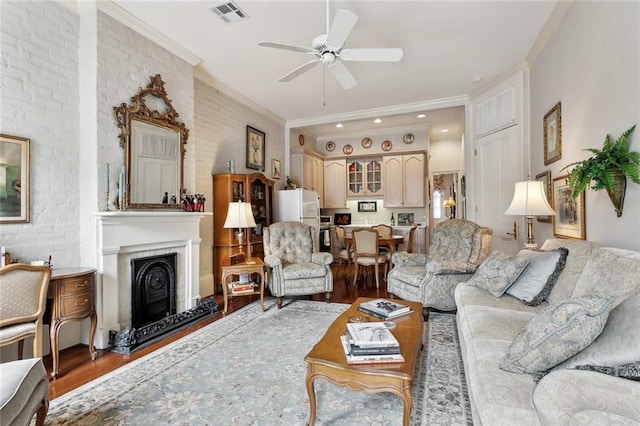 931 Chartres Street 13&14, New Orleans, LA 70116 - living area featuring wood finished floors, a ceiling fan, visible vents, and crown molding