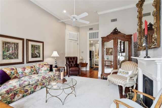 931 Chartres Street 13&14, New Orleans, LA 70116 - living room with a ceiling fan, crown molding, visible vents, and a fireplace