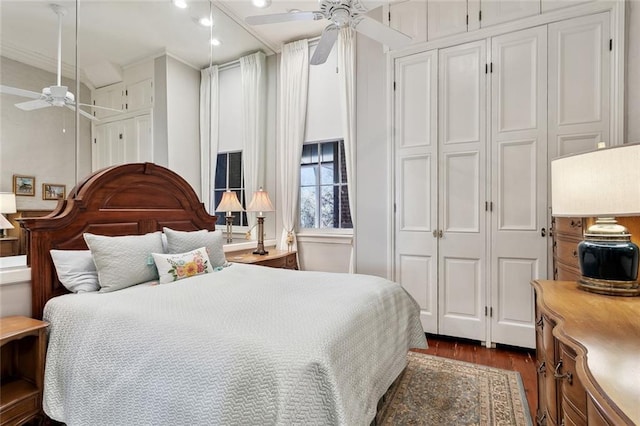 931 Chartres Street 13&14, New Orleans, LA 70116 - bedroom with crown molding, a closet, ceiling fan, dark wood-style floors, and recessed lighting