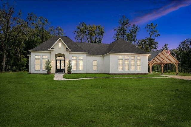 16202 W Bennett Rd, Loranger, LA 70446 - view of front of house with a front lawn, stucco siding, and a gazebo
