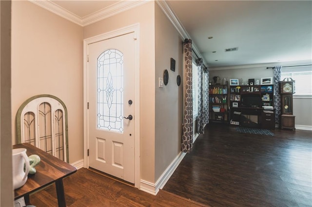 5613 W Esplanade Ave, Metairie, LA 70003 - foyer entrance with baseboards, ornamental molding, wood finished floors, and visible vents