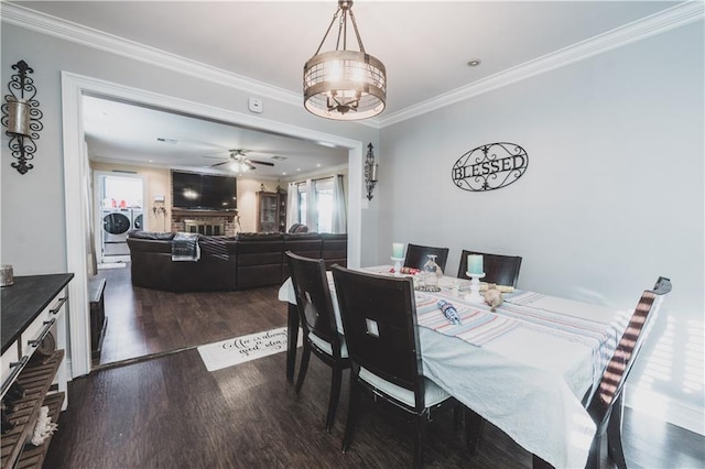 5613 W Esplanade Ave, Metairie, LA 70003 - dining area with wood finished floors, a ceiling fan, ornamental molding, and washer and clothes dryer