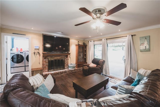 5613 W Esplanade Ave, Metairie, LA 70003 - living room with ornamental molding, wood finished floors, and washer and clothes dryer