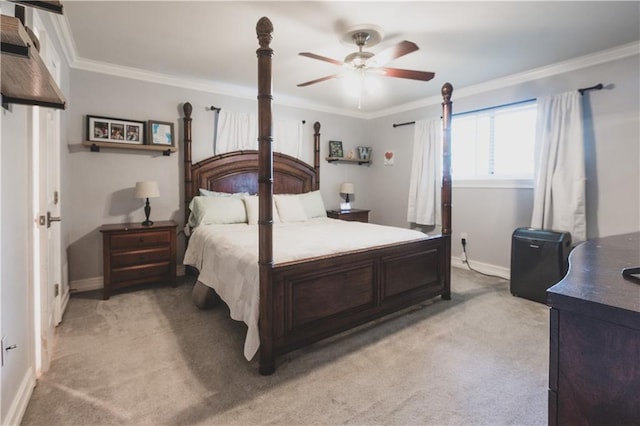 5613 W Esplanade Ave, Metairie, LA 70003 - bedroom featuring light carpet, a ceiling fan, baseboards, and crown molding