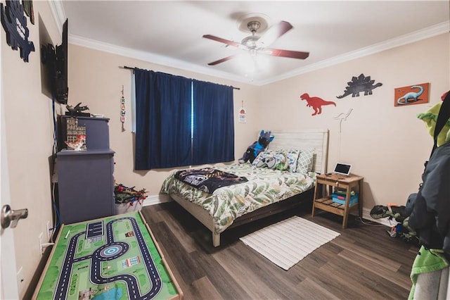 5613 W Esplanade Ave, Metairie, LA 70003 - bedroom with wood finished floors, crown molding, baseboards, and a ceiling fan
