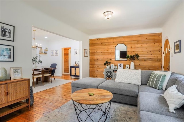 5839 Vicksburg St, New Orleans, LA 70124 - living area with hardwood / wood-style flooring and a chandelier