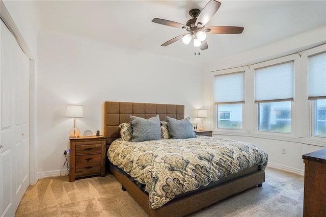5839 Vicksburg St, New Orleans, LA 70124 - bedroom featuring a ceiling fan, baseboards, and light colored carpet