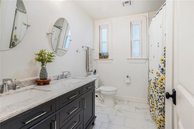 5839 Vicksburg St, New Orleans, LA 70124 - full bath featuring marble finish floor, toilet, a sink, and visible vents