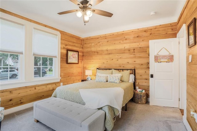 5839 Vicksburg St, New Orleans, LA 70124 - bedroom featuring ceiling fan, wood walls, and carpet