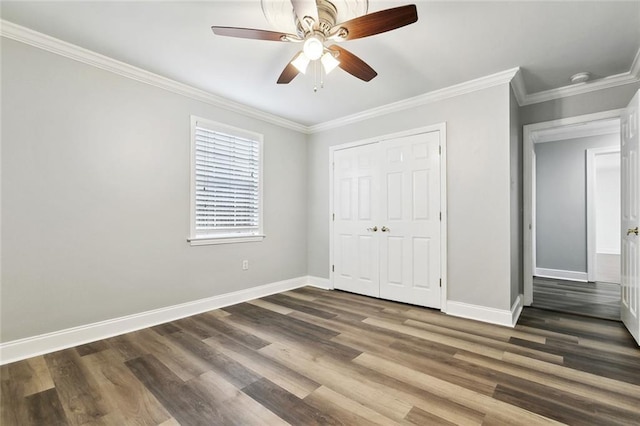 9504 Robin Ln, River Ridge, LA 70123 - unfurnished bedroom featuring wood finished floors, a closet, crown molding, and ceiling fan