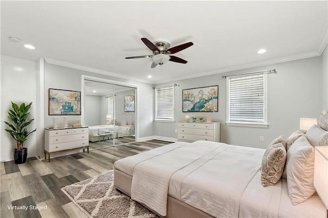 bedroom with recessed lighting, wood finished floors, and ornamental molding