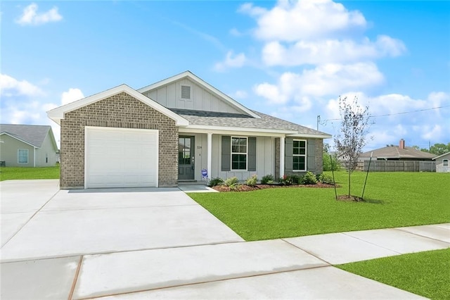 524 Helis Dr, Waggaman, LA 70094 - ranch-style home featuring board and batten siding, concrete driveway, brick siding, an attached garage, and roof with shingles