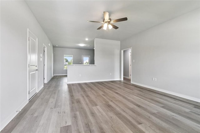 524 Helis Dr, Waggaman, LA 70094 - unfurnished living room featuring ceiling fan and wood finished floors