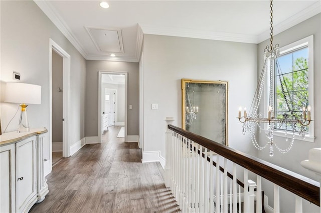 900 French St, New Orleans, LA 70124 - hall with an upstairs landing, wood finished floors, attic access, baseboards, and recessed lighting