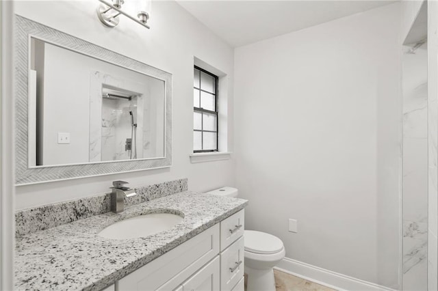 1534 Holiday Pl, New Orleans, LA 70131 - bathroom featuring baseboards, vanity, a marble finish shower, and toilet