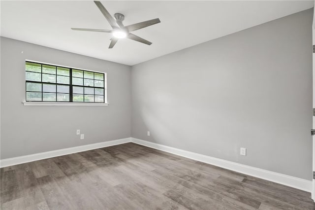 1534 Holiday Pl, New Orleans, LA 70131 - unfurnished room featuring wood finished floors, baseboards, and ceiling fan