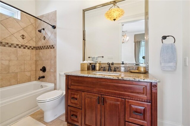 full bathroom featuring bathing tub / shower combination, toilet, an inviting chandelier, crown molding, and vanity