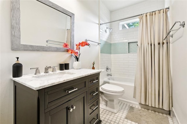 full bathroom with vanity, toilet, and shower / bath combo