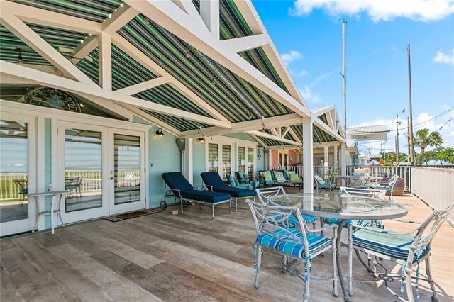 7930 Breakwater Drive 52&53, New Orleans, LA 70124 - wooden deck featuring an outdoor living space and french doors