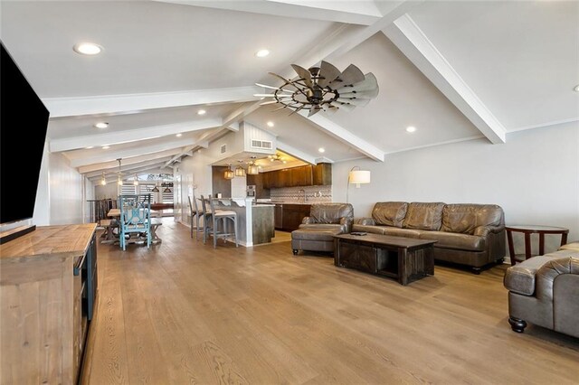 7930 Breakwater Drive 52&53, New Orleans, LA 70124 - living area featuring lofted ceiling with beams, recessed lighting, visible vents, and light wood-style flooring