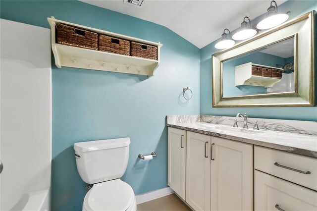 7930 Breakwater Drive 52&53, New Orleans, LA 70124 - bathroom with toilet, vaulted ceiling, baseboards, a shower, and vanity