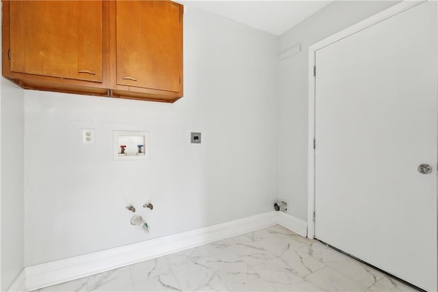 laundry area featuring marble finish floor, hookup for an electric dryer, gas dryer hookup, hookup for a washing machine, and cabinet space
