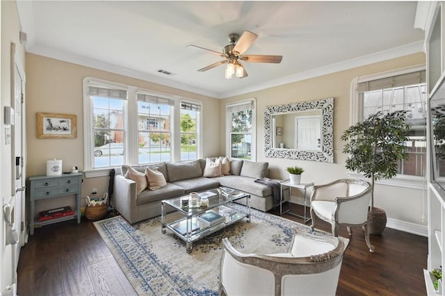 615 Filmore Ave, New Orleans, LA 70124 - living area with dark wood-type flooring, a ceiling fan, and crown molding
