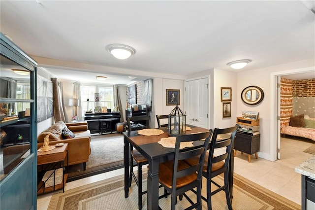615 Filmore Ave, New Orleans, LA 70124 - dining space featuring light tile patterned floors