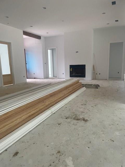 unfurnished living room featuring a fireplace