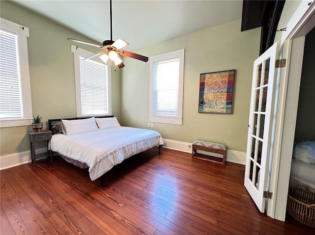 2415 Columbus St, New Orleans, LA 70119 - bedroom with hardwood / wood-style floors, a ceiling fan, and baseboards