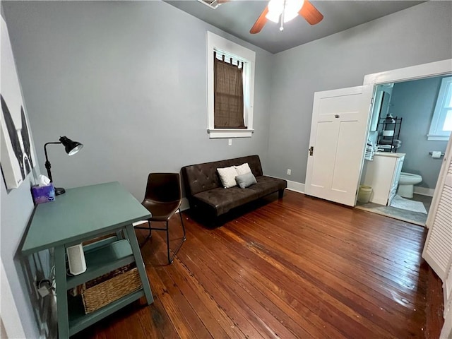 2415 Columbus St, New Orleans, LA 70119 - living area featuring hardwood / wood-style floors, baseboards, and ceiling fan
