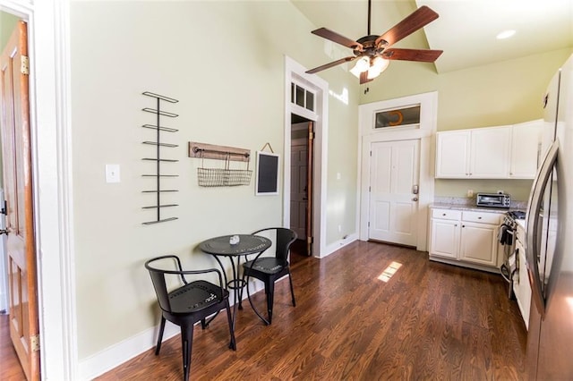 2415 Columbus St, New Orleans, LA 70119 - kitchen with white cabinets, a ceiling fan, and dark wood-style floors