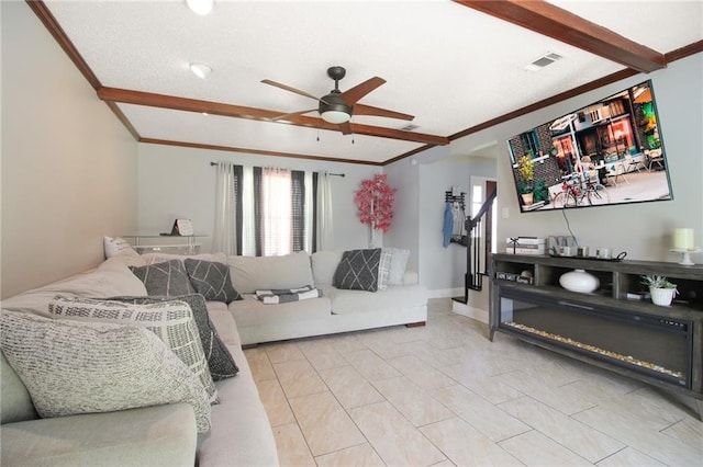 2172 Carmel Valley Dr, La Place, LA 70068 - living room with ornamental molding, a ceiling fan, and visible vents