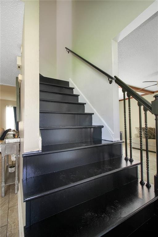2172 Carmel Valley Dr, La Place, LA 70068 - staircase featuring a ceiling fan