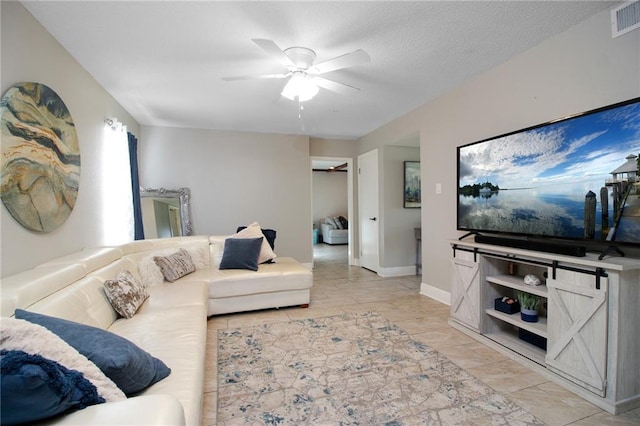 2172 Carmel Valley Dr, La Place, LA 70068 - living area featuring visible vents, a ceiling fan, and baseboards
