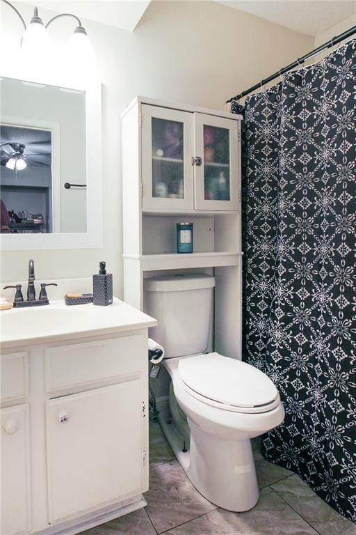 2172 Carmel Valley Dr, La Place, LA 70068 - full bathroom with vanity, toilet, and a shower with shower curtain