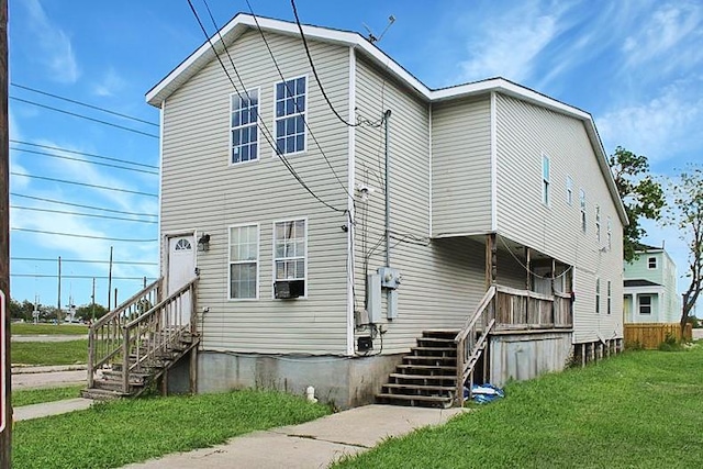 264749 Louisa St, New Orleans, LA 70117 - rear view of property with a yard and stairs