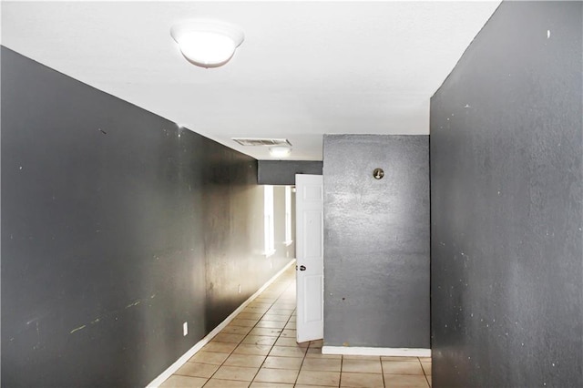 264749 Louisa St, New Orleans, LA 70117 - corridor with light tile patterned flooring and visible vents