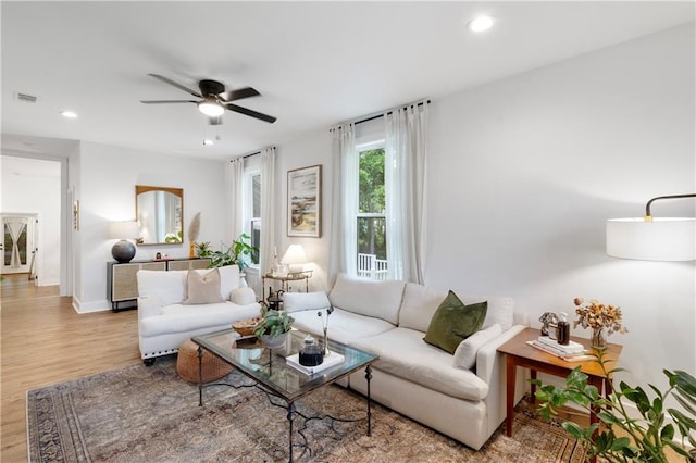 71463 Haynes St, Abita Springs, LA 70420 - living area featuring a ceiling fan, wood finished floors, baseboards, visible vents, and recessed lighting