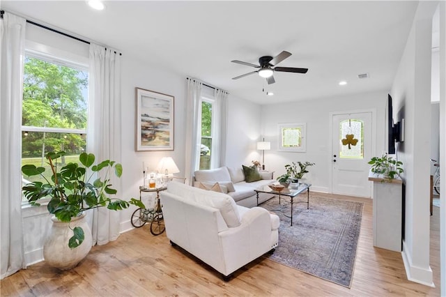 71463 Haynes St, Abita Springs, LA 70420 - living area featuring ceiling fan, baseboards, light wood-style floors, and recessed lighting