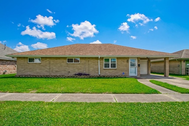 1021 Maplewood Dr, Harvey, LA 70058 - single story home featuring a front lawn, a carport, concrete driveway, and brick siding