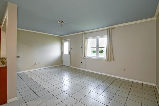 1021 Maplewood Dr, Harvey, LA 70058 - unfurnished room with ornamental molding, light tile patterned floors, and baseboards
