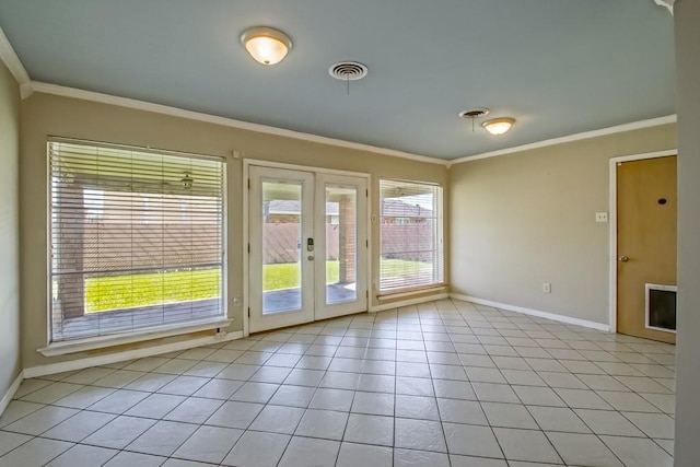 1021 Maplewood Dr, Harvey, LA 70058 - doorway with light tile patterned floors, french doors, crown molding, and baseboards
